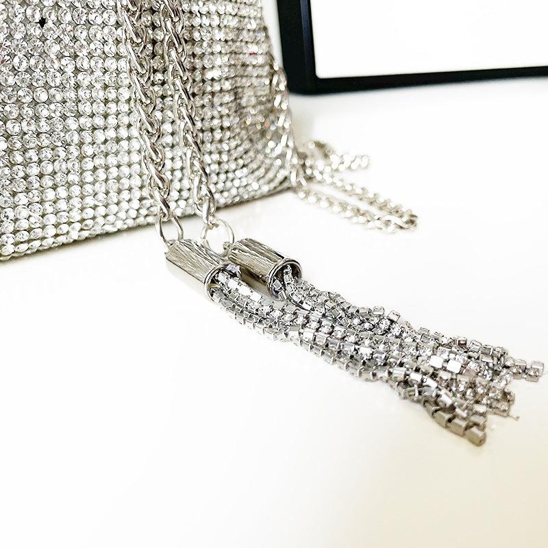 CRYSTAL EMBELLISHED BUCKET BAG IN SILVER